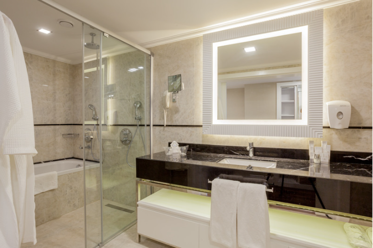 glass shower doors on a bathtub